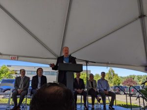 Colorado Governor Jared Polis speaks at the grand opening of Atom Computing's new R&D facility